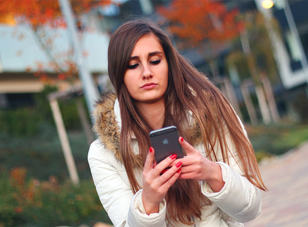 Lady-using-a-smartphone Lady-using-a-smartphone
